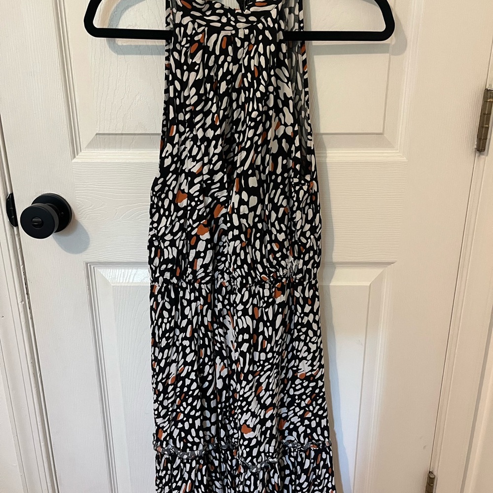 Chic Black and White Patterned Dress with Orange Accents